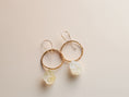 Load image into Gallery viewer, Oval citrine dangle earrings worn, featuring gold filled wire and raw gemstone detail