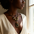 Load image into Gallery viewer, One-of-a-kind handmade wire weave brass statement necklace with red aventurine and jade worn on neck, collector artisan jewelry by bykjones North Carolina
