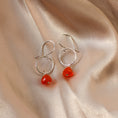 Load image into Gallery viewer, Lightweight sterling silver earrings with natural orange carnelian gemstones
