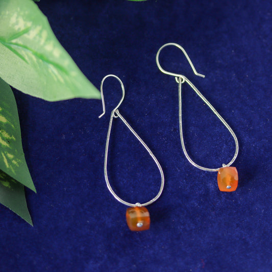 Handmade sterling silver earrings with cognac chalcedony gemstones in a drop dangle style.