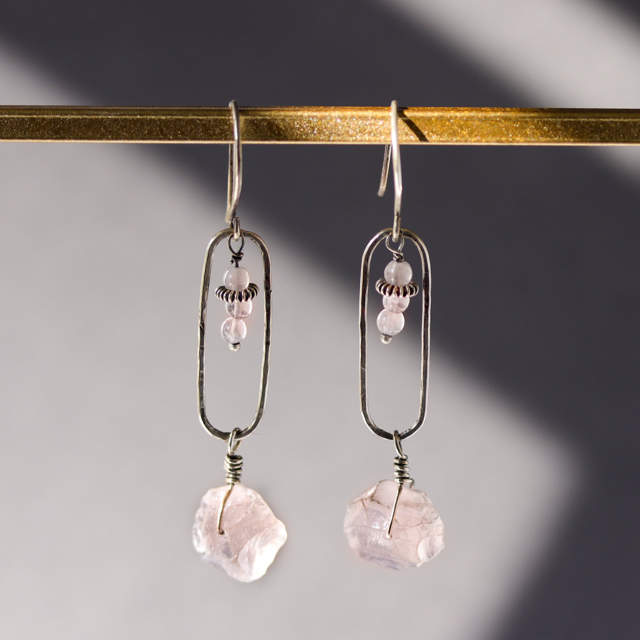 Ethically sourced pink quartz earrings with drop dangle sterling silver design