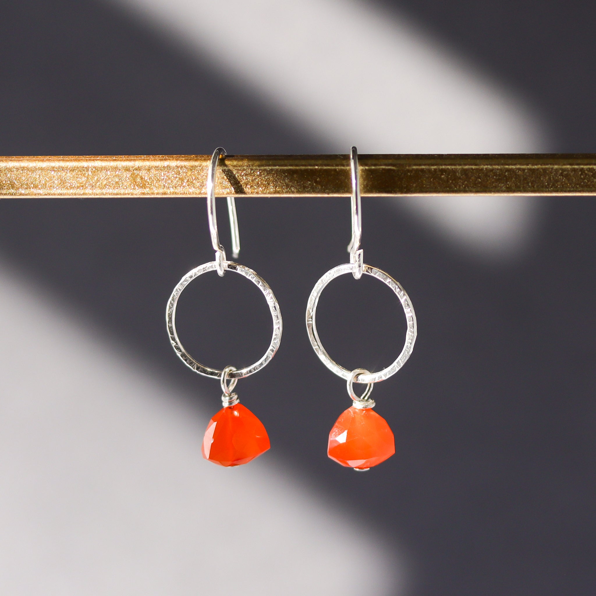 Ethically sourced carnelian earrings with 925 sterling silver drop dangle design.