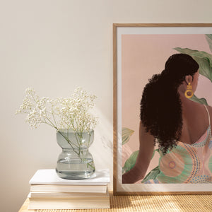 Bohemian-inspired artwork featuring a black woman in a pastel dress, celebrating beauty and confidence