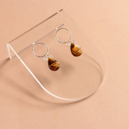 Delicate sterling silver earrings featuring tiger eye gemstones