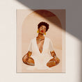 Load image into Gallery viewer, A Black woman with eyes closed sits in a meditative pose on a blush pink background
