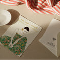 Load image into Gallery viewer, Serene birthday card illustration of a woman in a flower dress with gold foil earrings.
