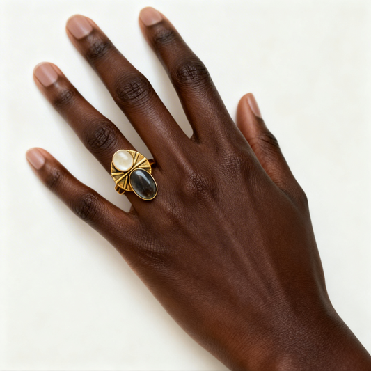 Bold two-stone handmade brass ring with mother of pearl and black lip shell worn on hand, one-of-a-kind statement jewelry by bykjones North Carolina