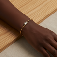 Load image into Gallery viewer, Minimalist handmade brass cuff bracelet with Swarovski crystal worn on wrist, delicate boho jewelry by bykjones handmade in North Carolina
