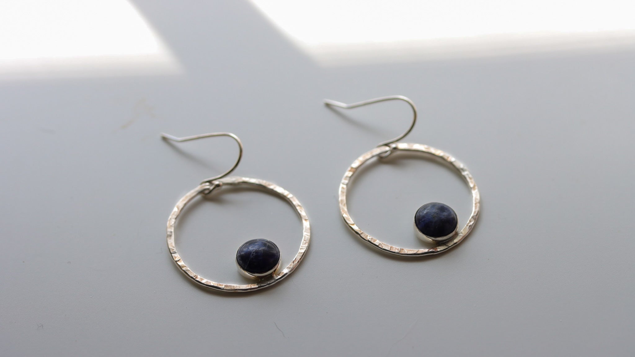Artisan sterling silver circle earrings with sodalite gemstone, handcrafted jewelry