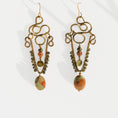Load image into Gallery viewer, Brass chandelier earrings with sculptural wire work, jasper, red aventurine, and pyrite — handmade by bykjones

