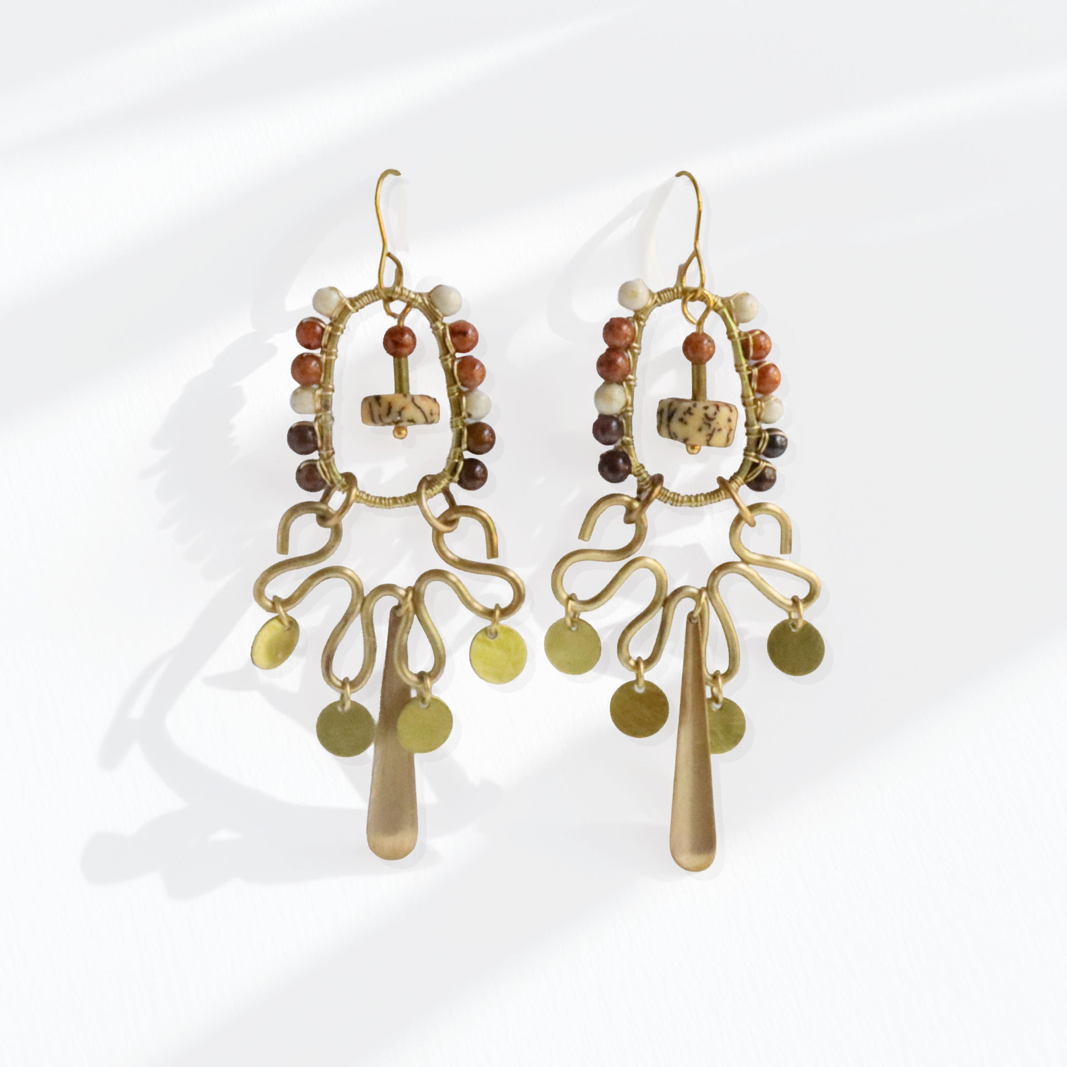 Brass hoop fringe earrings with stone-wrapped oval frame, jasper, tiger iron, and white howlite — handmade by bykjones