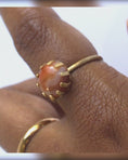Load and play video in Gallery viewer, Fancy jasper brass statement ring handmade, orange and cream two-tone stone, prong setting rotating on finger, adjustable brass prong ring, bykjones
