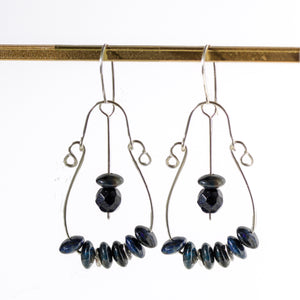 Handmade large sterling silver hoop earrings with dark blue Dumortierite gemstones, 2.5 inches long, perfect for a bold, bohemian look.