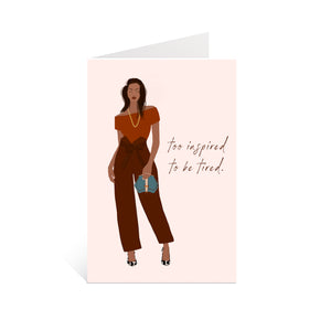 Illustration of a woman in an off-the-shoulder rust shirt, brown pants, holding a cute bag, with black and white shoes and the text "Too Inspired to Be Tired" on a greeting card.