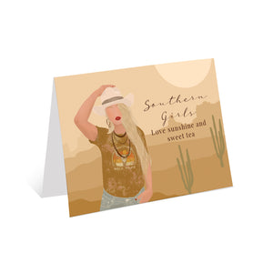 Illustration of a woman with a cowgirl hat, cute t-shirt, and long blonde hair, with the quote "Southern Girls Love Sunshine and Sweet Tea" on a greeting card